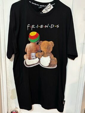 Switch FRIENDS Black Graphic Tee with Teddy and Baby.